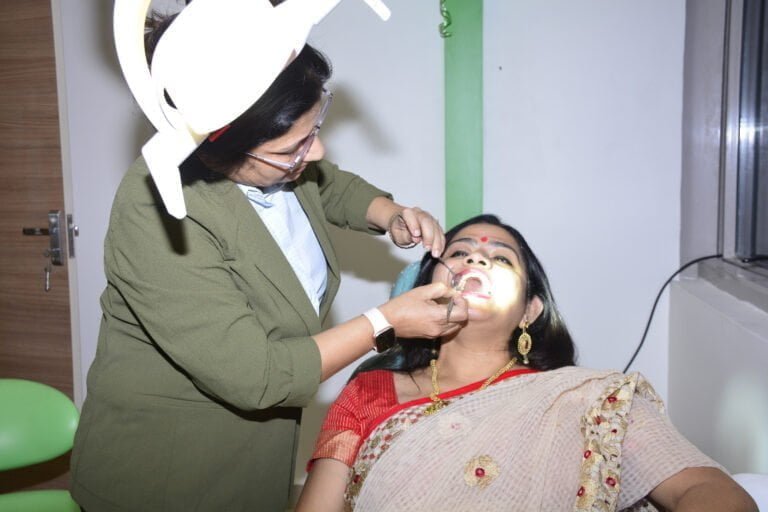 About us ,here in the pic dr anuradha treating a patient in clinic